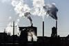 Industrial chimneys smoking with pollution